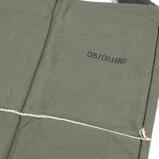 Picture of USGI 4-CELL BANDOLIER, NOS, HOLDS STRIPPER CLIPS OR AR/M14 MAGS