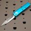 Picture of MICROTECH UTX-85 D/E OTF AUTOMATIC KNIFE, TURQUOISE, 3.125 INCH, SATIN, 232-4TQ