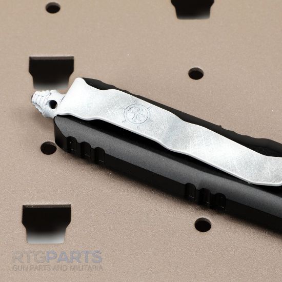 Picture of MICROTECH UTX-85 STEAMBOAT WILLIE D/E OTF AUTOMATIC KNIFE, BLACK, 3.125 INCH, DISTRESSED WHITE, 232-1SB