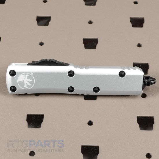 Picture of MICROTECH UTX-85 T/E OTF AUTOMATIC KNIFE, NATURAL CLEAR, 3.125 INCH, SERRATED, 233-3CR