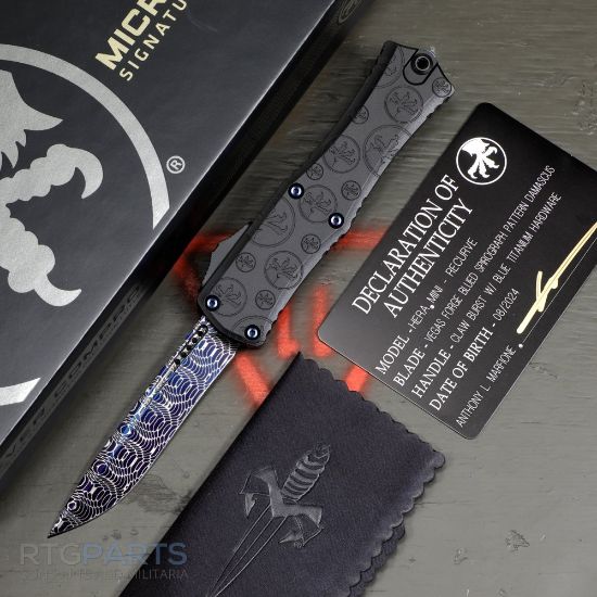 Picture of MICROTECH HERA II MINI SIGNATURE SERIES, S/E RECURVE OTF, BLUE SPIROGRAPH DAMASCUS, CLAW BURST DEEP ENGRAVED, 3 INCH, 1705M-16MS1