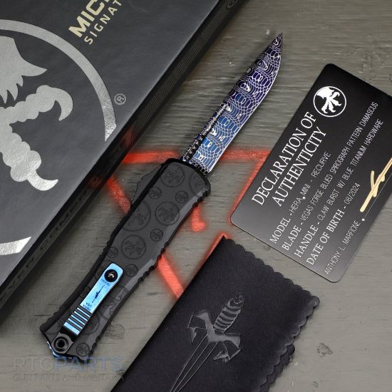 Picture of MICROTECH HERA II MINI SIGNATURE SERIES, S/E RECURVE OTF, BLUE SPIROGRAPH DAMASCUS, CLAW BURST DEEP ENGRAVED, 3 INCH, 1705M-16MS1
