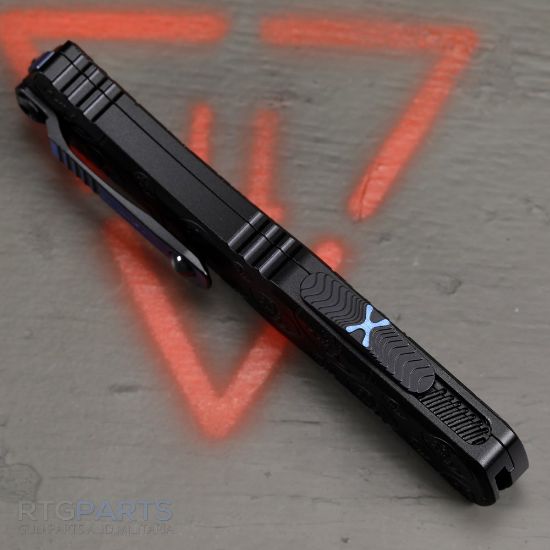 Picture of MICROTECH HERA II MINI SIGNATURE SERIES, S/E RECURVE OTF, BLUE SPIROGRAPH DAMASCUS, CLAW BURST DEEP ENGRAVED, 3 INCH, 1705M-16MS1
