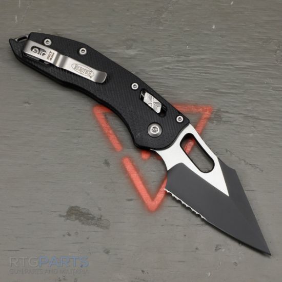 Picture of MICROTECH STITCH, S/E, RAM-LOK, BLACK, FLUTED G10, 3.7 INCH, BLACK BLADE, SERRATED, 169RL-2FLGTBK