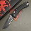 Picture of MICROTECH AMPHIBIAN, S/E, RAM-LOK, BLACK G10, 3.9 INCH, BLACK BLADE, SERRATED, 137RL-2FLGTBK