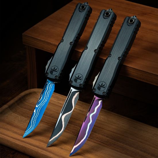 Picture of MICROTECH ULTRATECH GEN III ZBP, MARFIONE SELECT, BAKER FORGE, COPPERMAI DAMASCUS, DLC HARDWARE & PURPLE TITANIUM ACCENTS, 3.5" CLIP POINT S/E, 1121-16MS3